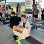 Kids working to build a tool box 3