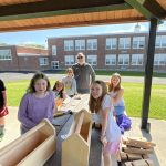 Kids working to build a tool box 7