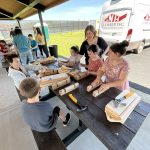 Kids working to build a tool box 1