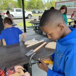 Kids working to build a tool box 9