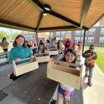 Kids working to build a tool box 12